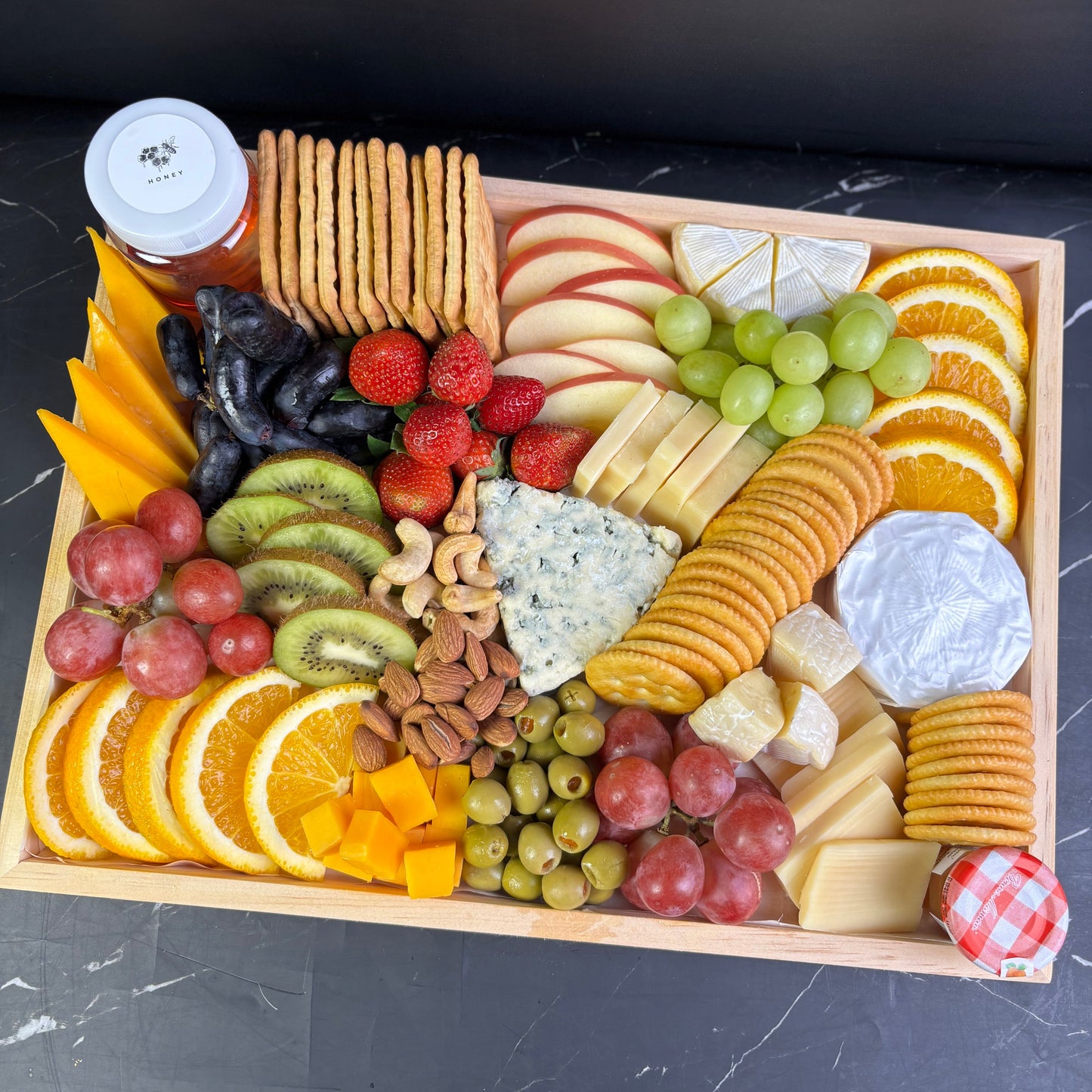 Blue cheese platter with grapes, nuts, cold cuts and crackers – luxury cheese board delivery in Jakarta, Bintaro, and Tangerang by Le Bliss Platter