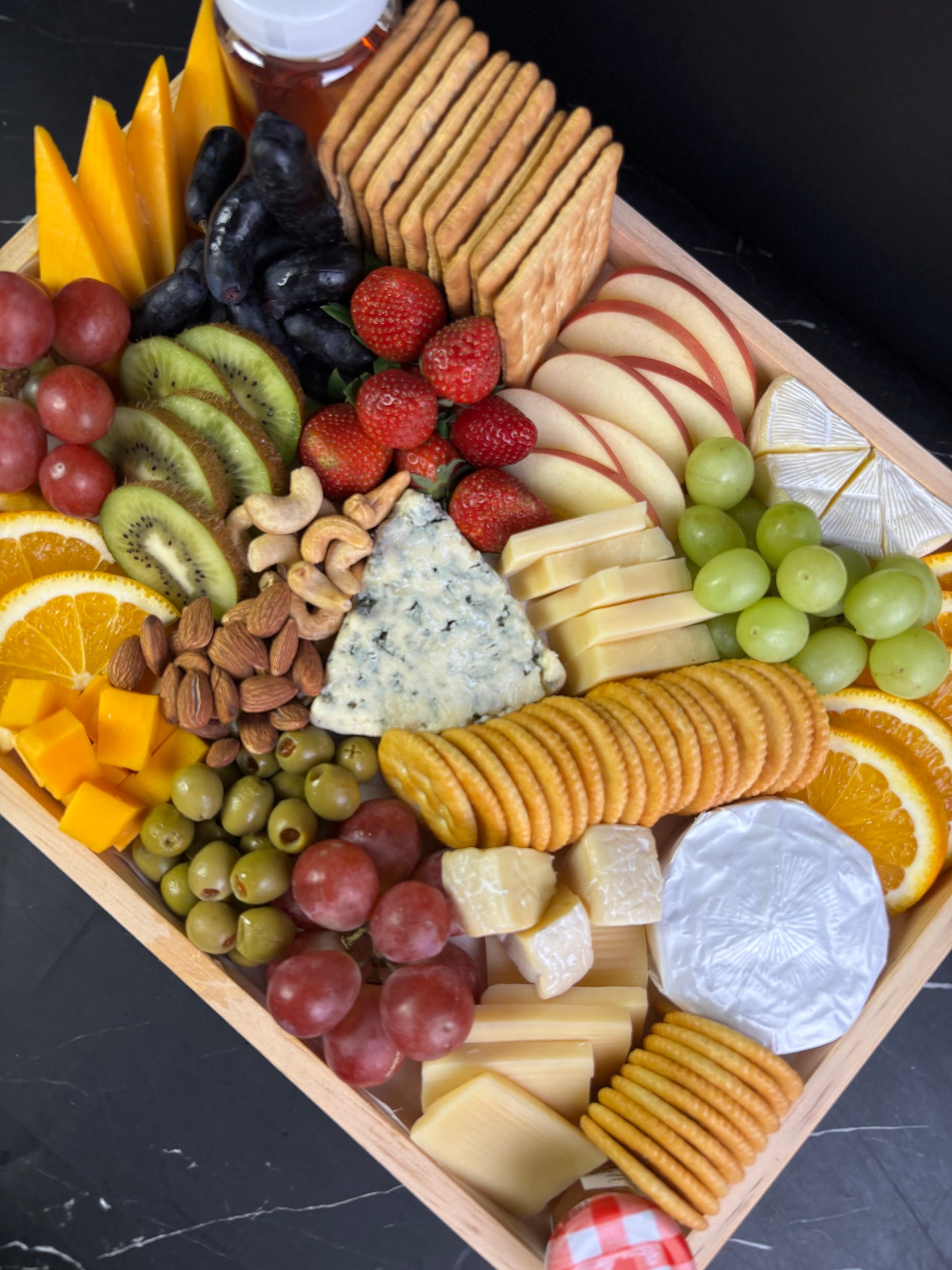 Blue cheese platter with grapes, nuts, cold cuts and crackers – luxury cheese board delivery in Jakarta, Tangerang - Charcuterie Board