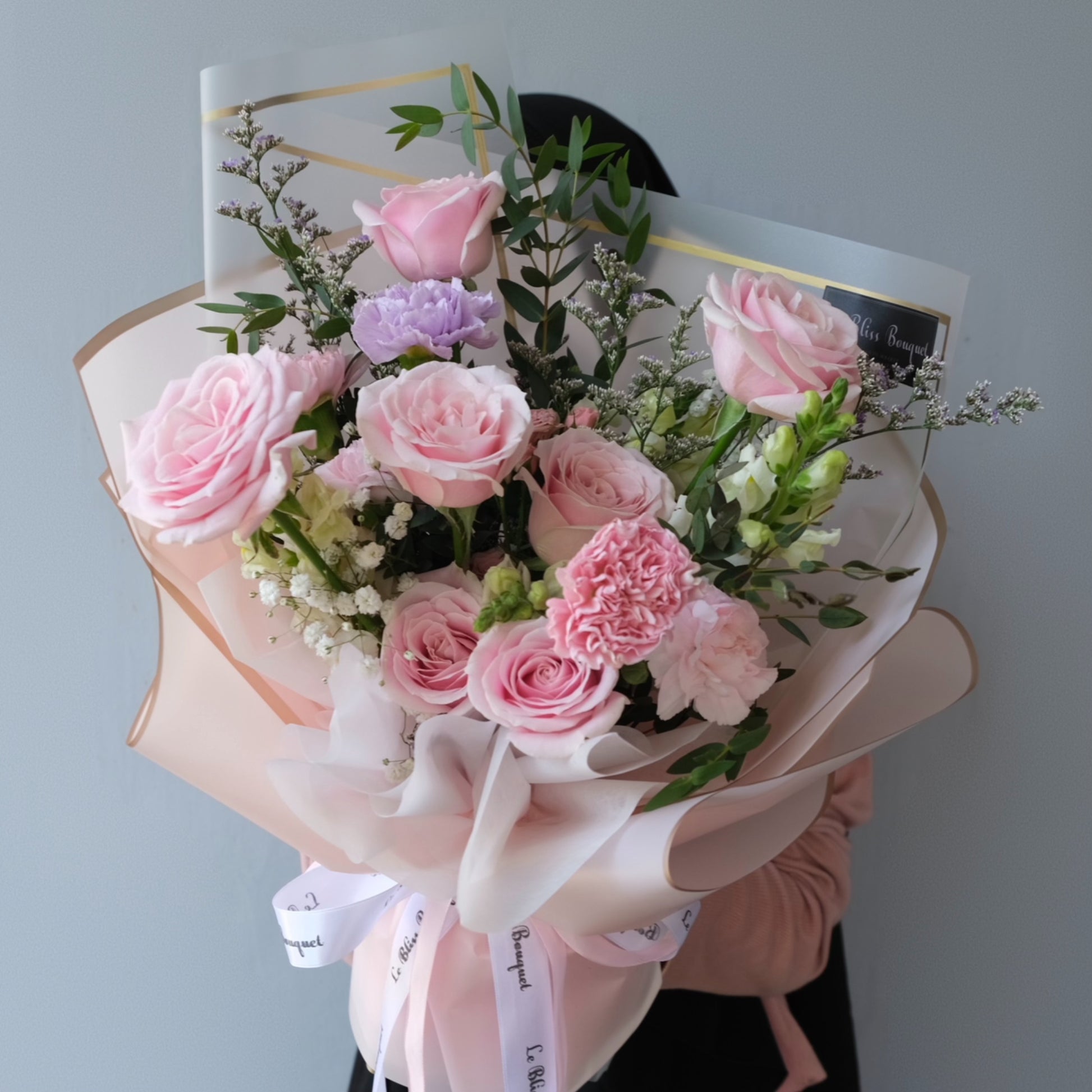 Bouquet of pink roses and other flowers. Le Bliss Bouquet’s Sweet Pink Medium Bouquet — elegant roses & carnations in soft pink tones. Same-day delivery across Jabodetabek, Surabaya & Cirebon.