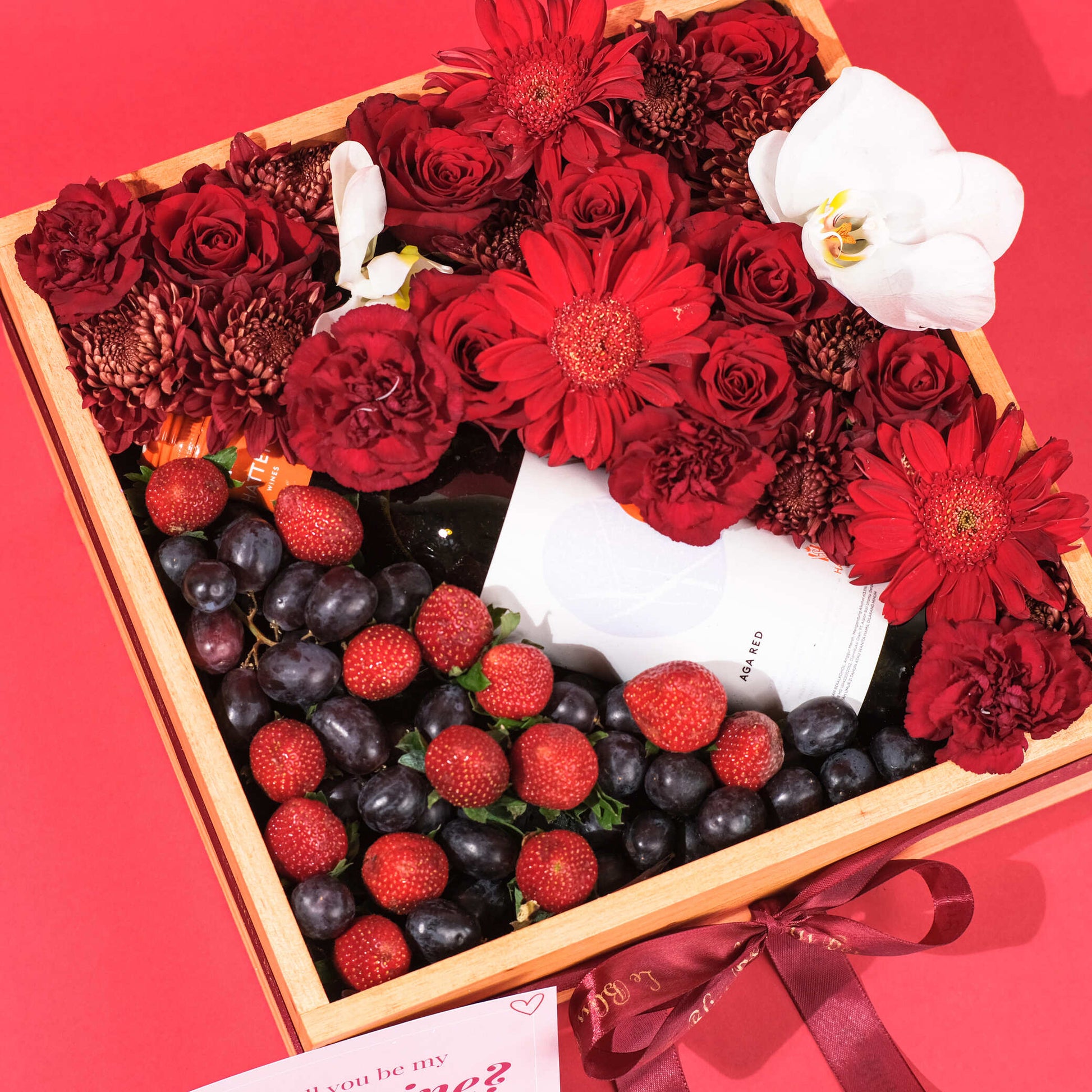 wine hamper mix with fruit and flower by le bliss surabaya