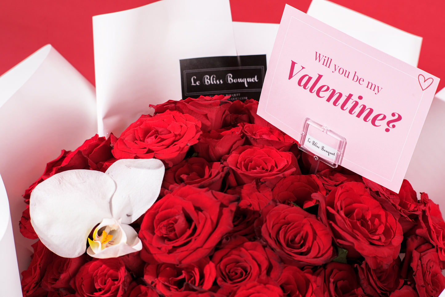 60 Red Roses Orchid Bouquet