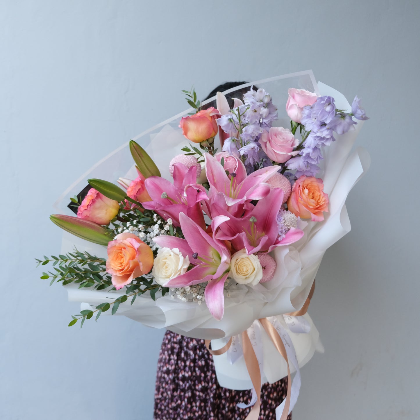 Fresh delphinium and pink lily bouquet, ideal for delivery to Jakarta and surrounding areas. Florist Jakarta