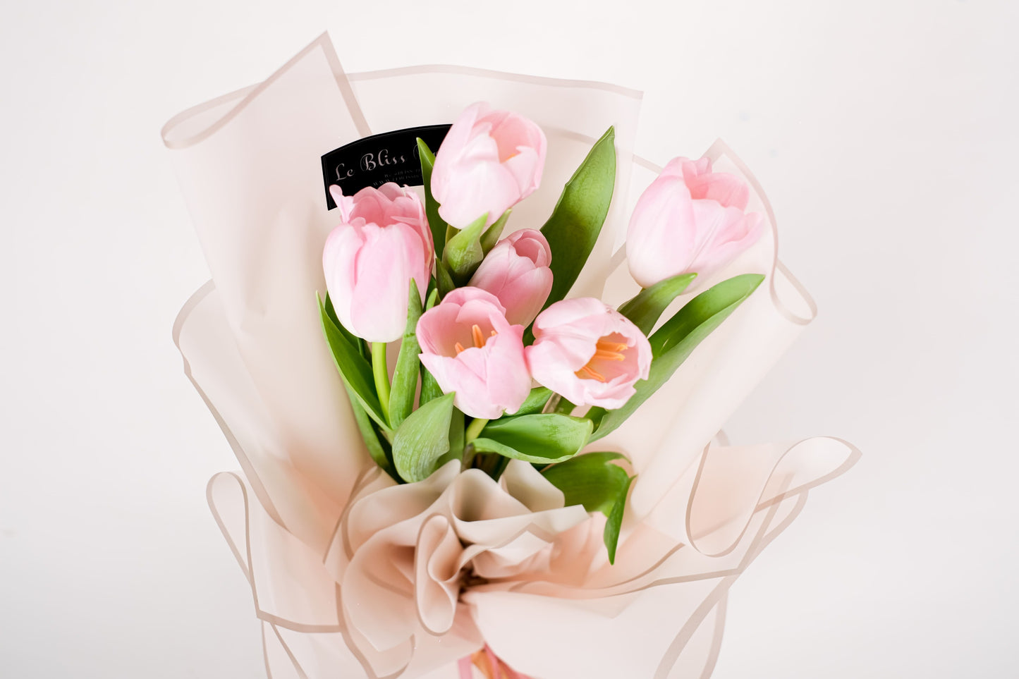 Fresh tulips arranged in a modern and elegant bouquet design