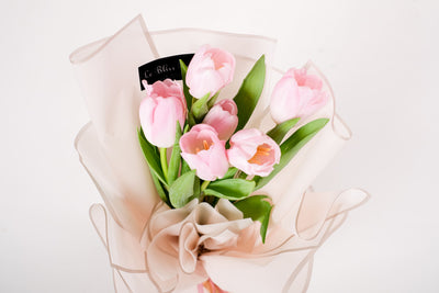 Fresh tulips arranged in a modern and elegant bouquet design