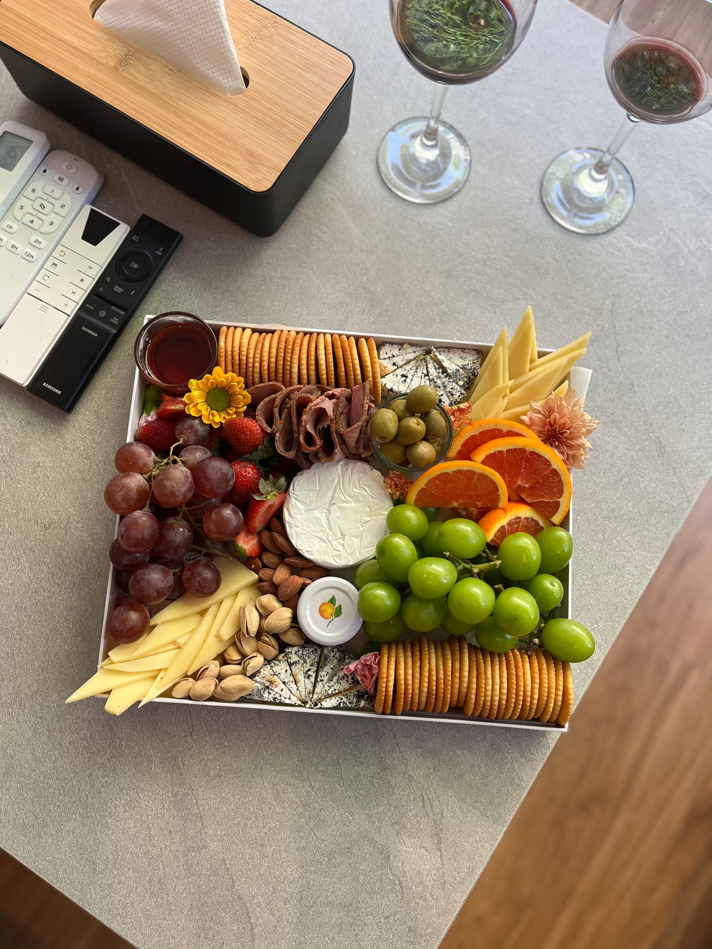 Gourmet charcuterie platter featuring prosciutto, salami, and cheese in Jakarta