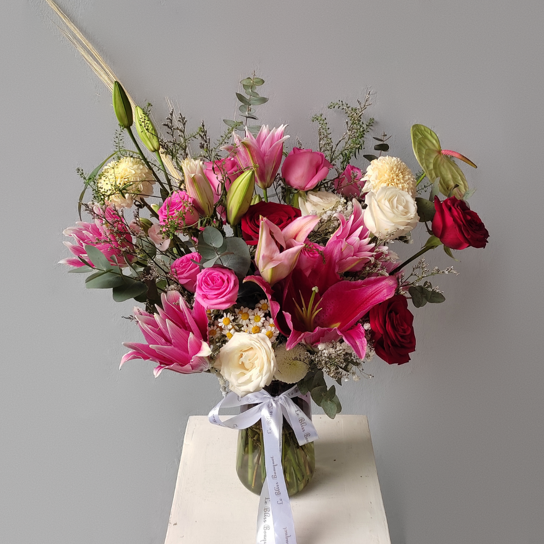 Blissful Pink Fanta Lily Red Vase