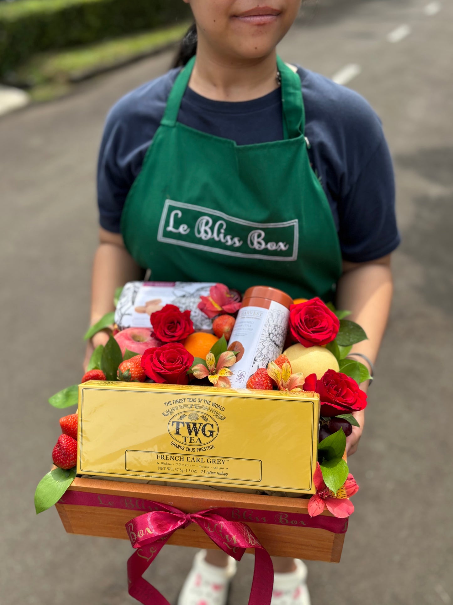 Luxury hamper with TWG Tea, cookies, and imported fresh fruits in a rustic wooden box, gift-ready by Le Bliss Box - jabodetabek delivery.