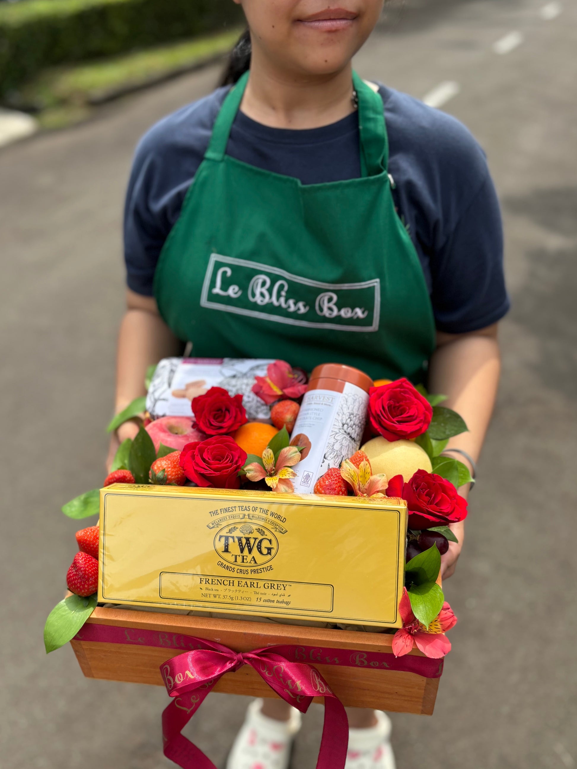 Luxury hamper with TWG Tea, cookies, and imported fresh fruits in a rustic wooden box, gift-ready by Le Bliss Box - jabodetabek delivery.