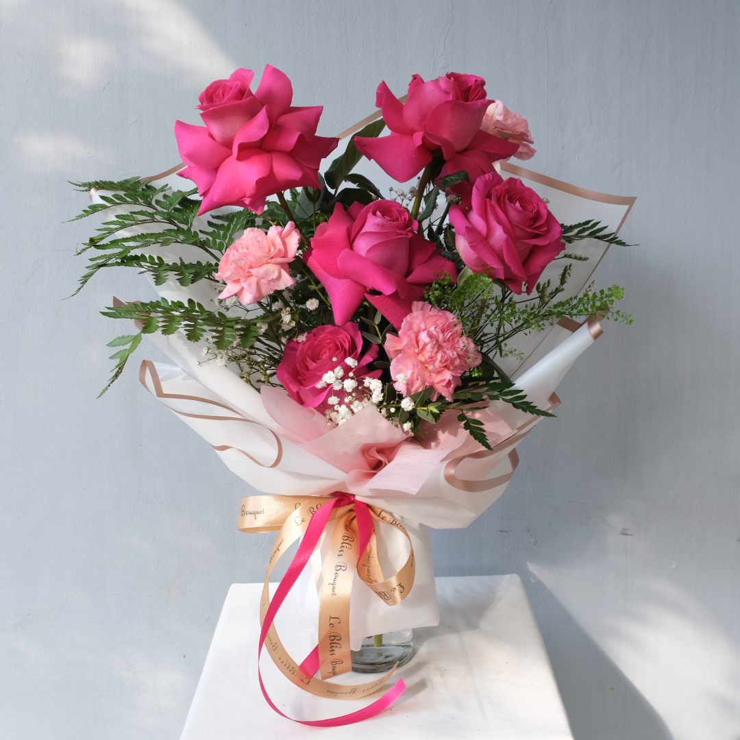 Pink Floyd rose bouquet in a clear glass bottle, curated by Le Bliss Bouquet - perfect for delivery across Jakarta, Bintaro, and Cirebon.