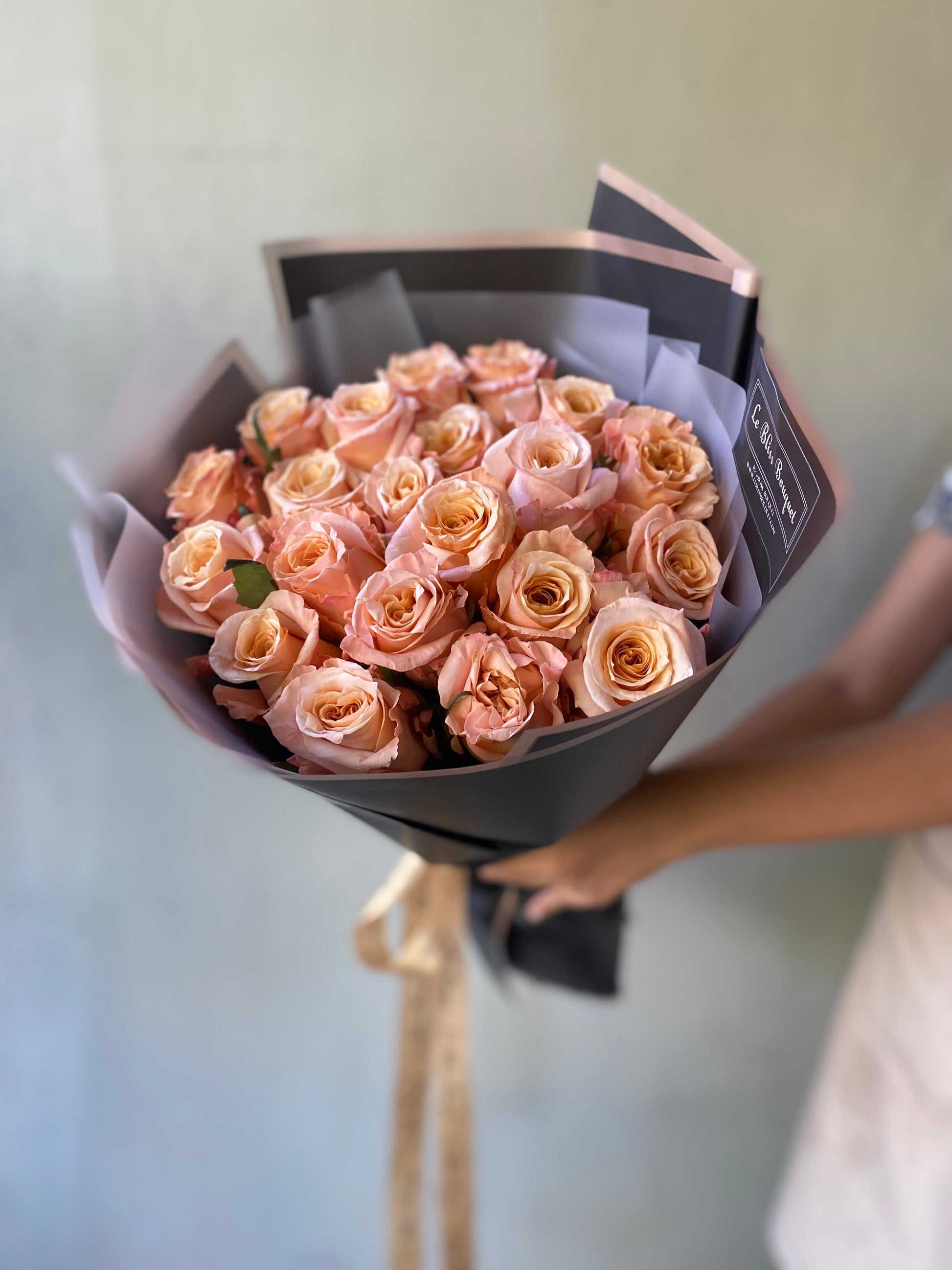 Round bouquet with shimmer Ecuador roses in champagne peach tone – luxury gift by Le Bliss Bouquet, bouquet Surabaya