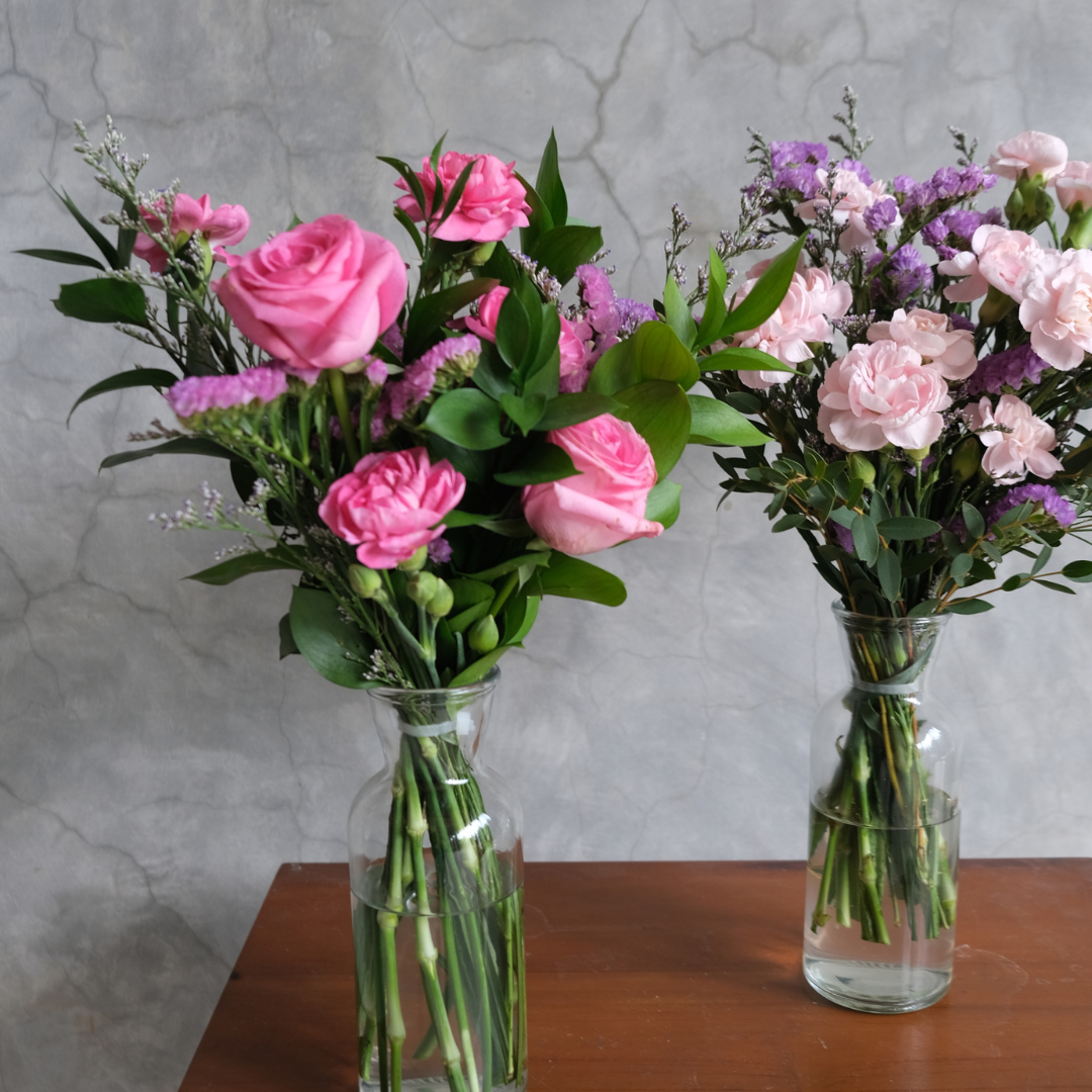 Simple bouquet in a bottle with pastel flowers – perfect gift from Le Bliss Bouquet, florist Jakarta, Cirebon, and Bintaro.