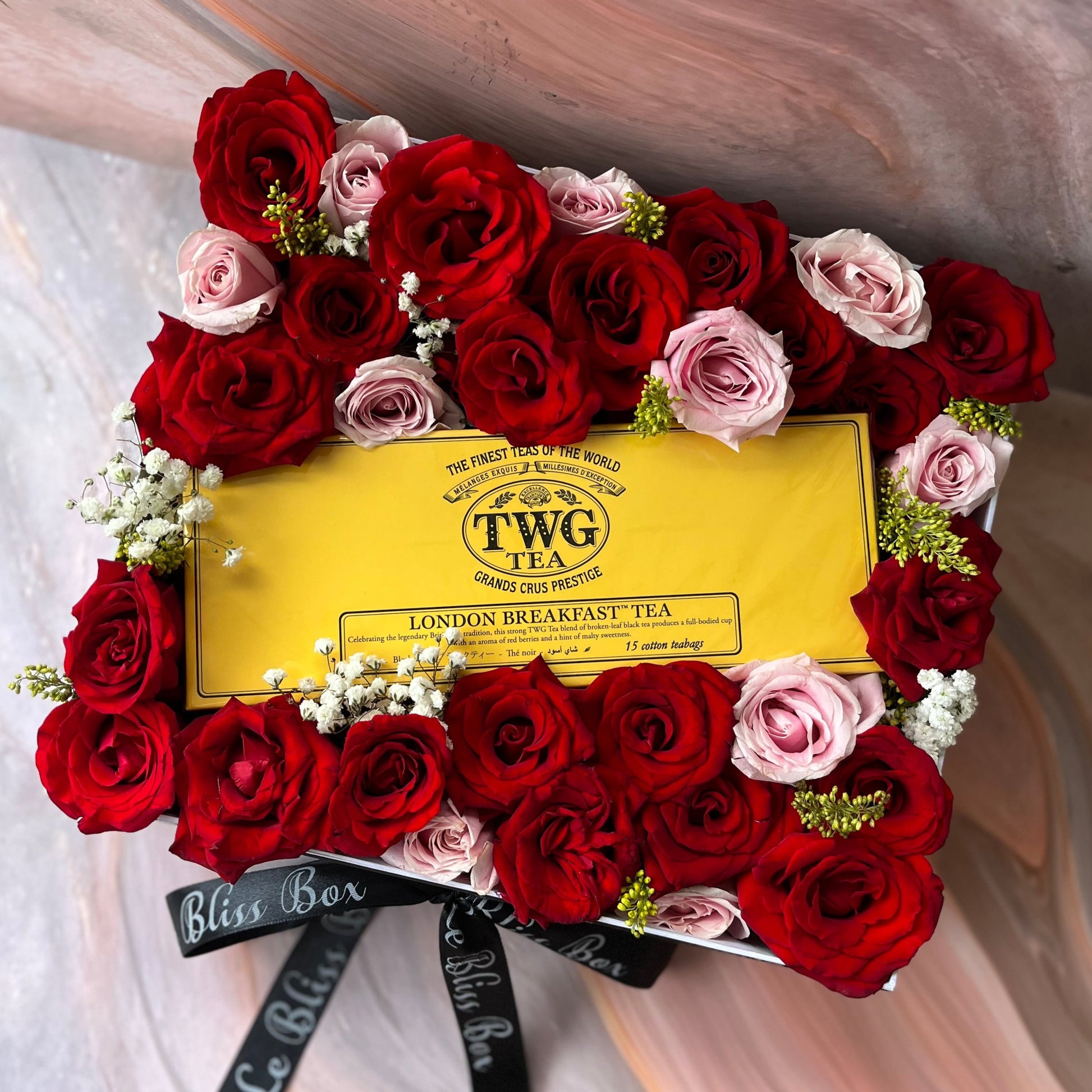 TWG Tea Hamper Jakarta featuring premium tea selections and elegant rose arrangements by Le Bliss Bouquet