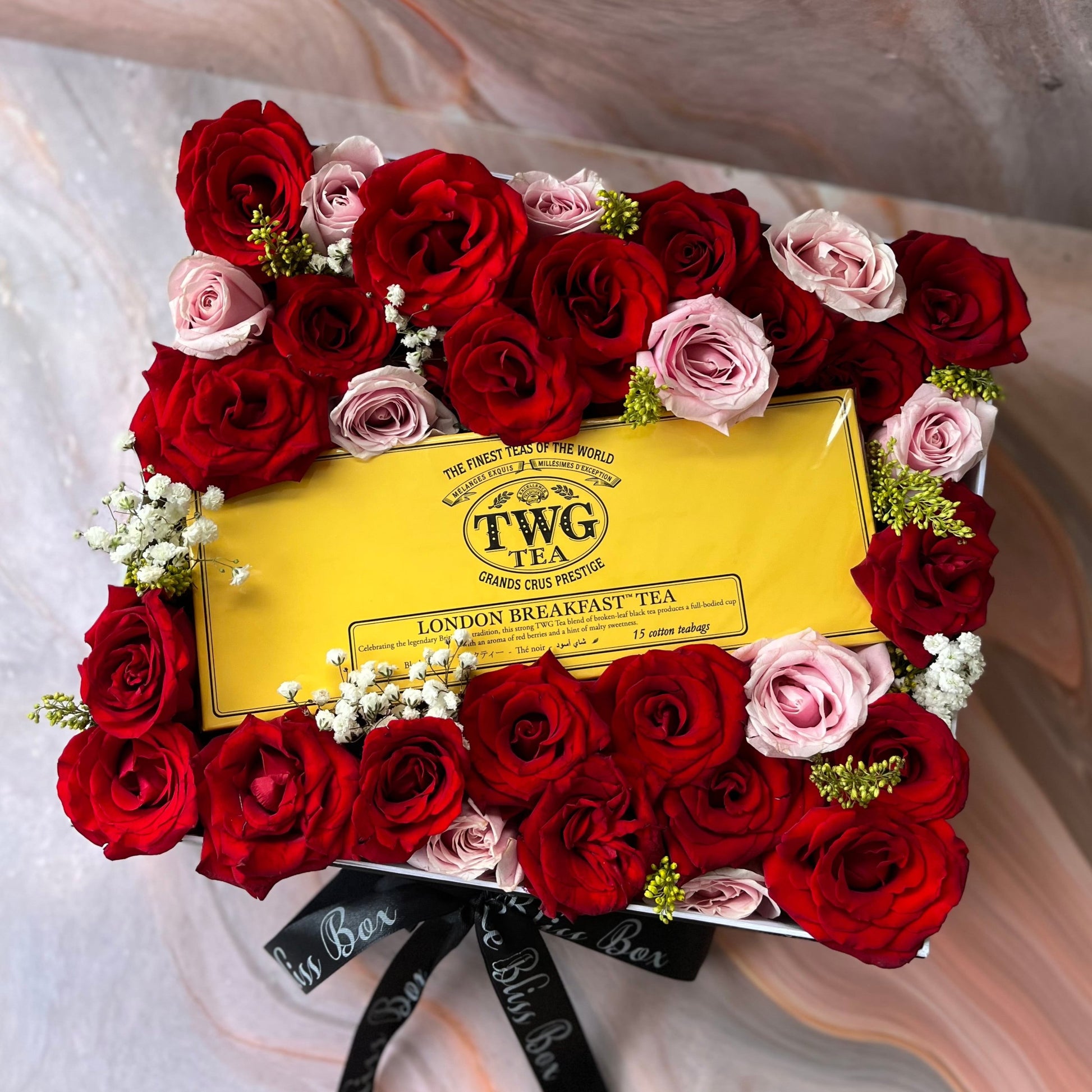 TWG Tea Hamper in Jakarta Tangerang Indonesia featuring premium tea selections and elegant rose arrangements by Le Bliss Bouquet