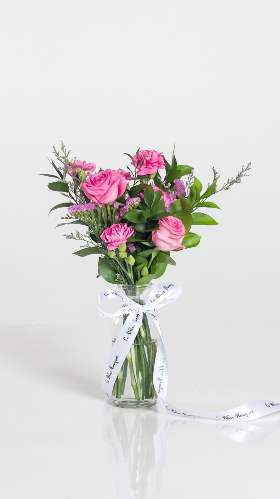 bouquet in a bottle with pink revival rose and carnation – perfect gift from Le Bliss Bouquet, florist Jakarta, Cirebon, Bintaro, Tangerang