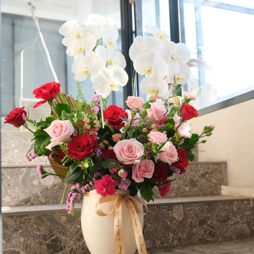 double orchid arrangement with red rose, soft pink, carnation florist jakarta