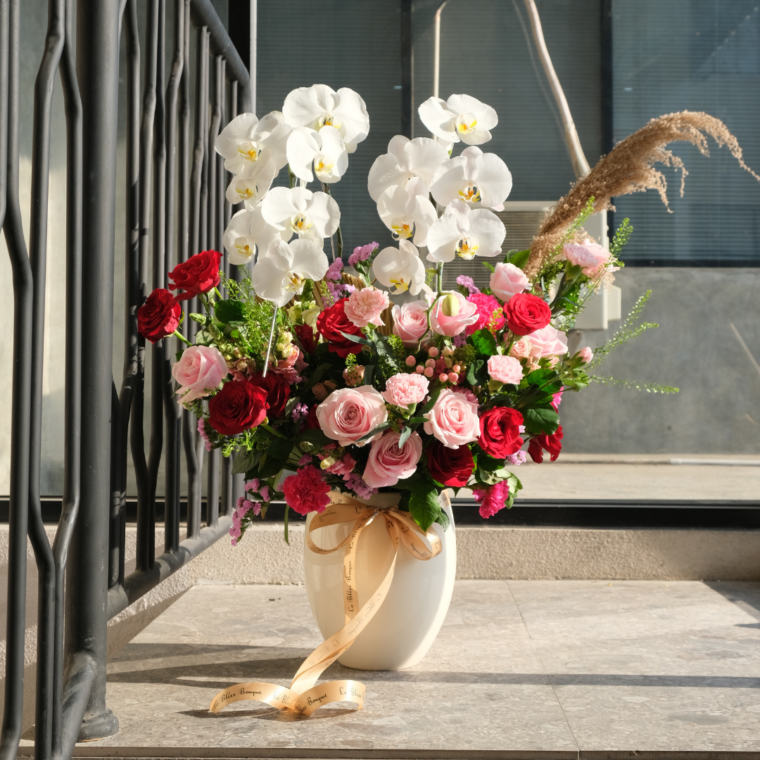 double orchid arrangement with red rose, soft pink, carnation rose florist jakarta
