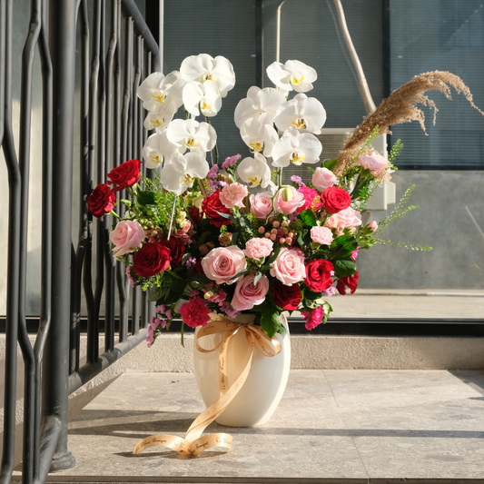double orchid arrangement with red rose, soft pink, carnation rose florist jakarta