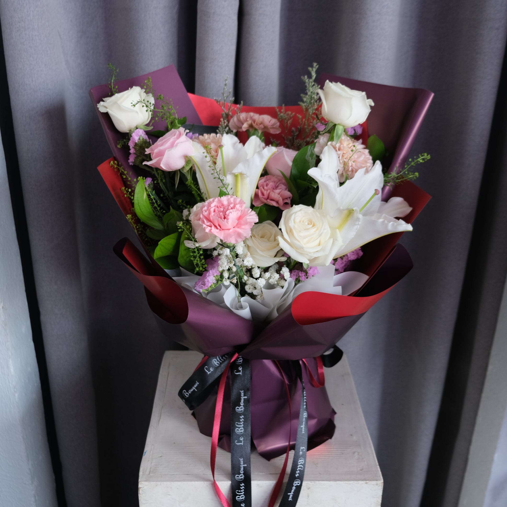 lily carnation rose babysbreath bouquet maroon
