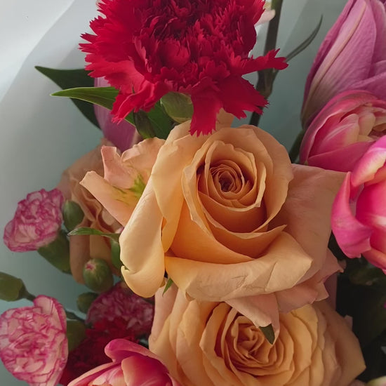 hand bouquet jakarta filled with tulips lily carnation and rose import
