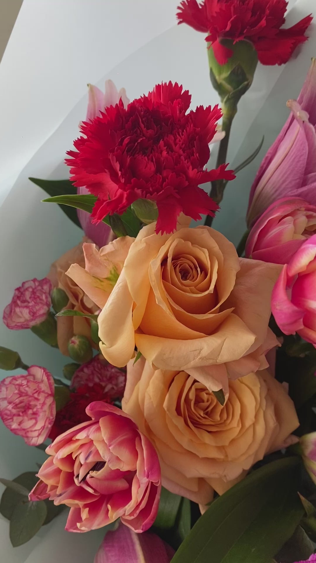 hand bouquet jakarta filled with tulips lily carnation and rose import