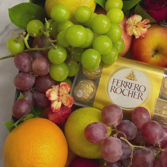 Luxury fruit hamper in Jakarta featuring a fruit box with imported seasonal fruits and Ferrero Rocher chocolates